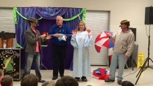 Zendor invites three guests on stage to help. The guests where silly props.