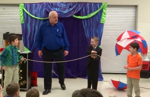 Zendor has three students help him perform magic